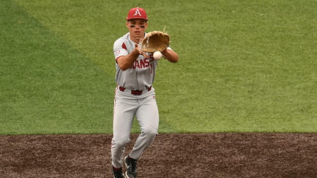 Arkansas' Robert Moore (1) stops a ground ball during the Tennessee and Arkansas NCAA baseball game in Knoxville, Tenn. on Sunday, May 16, 2021. Kns Vols Arkansas Basebal